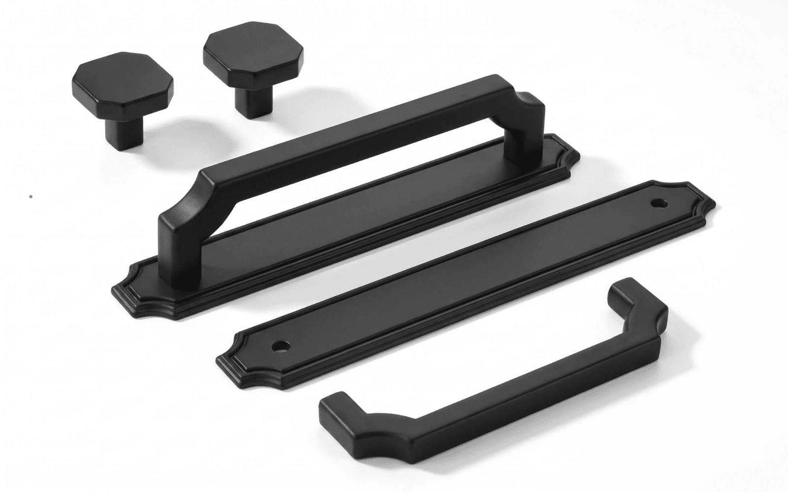 Coordinated matte black cabinet pulls knobs and backplates
